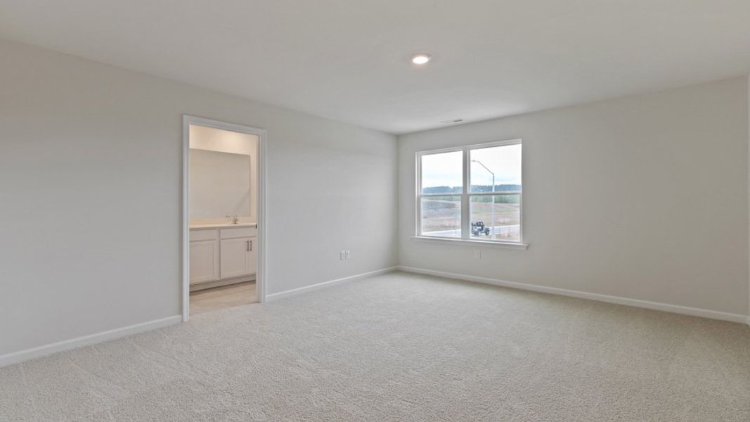 Spacious, unfurnished interior of a new home in The Grove at Matthews Landing, Fuquay Varina (Image 20).