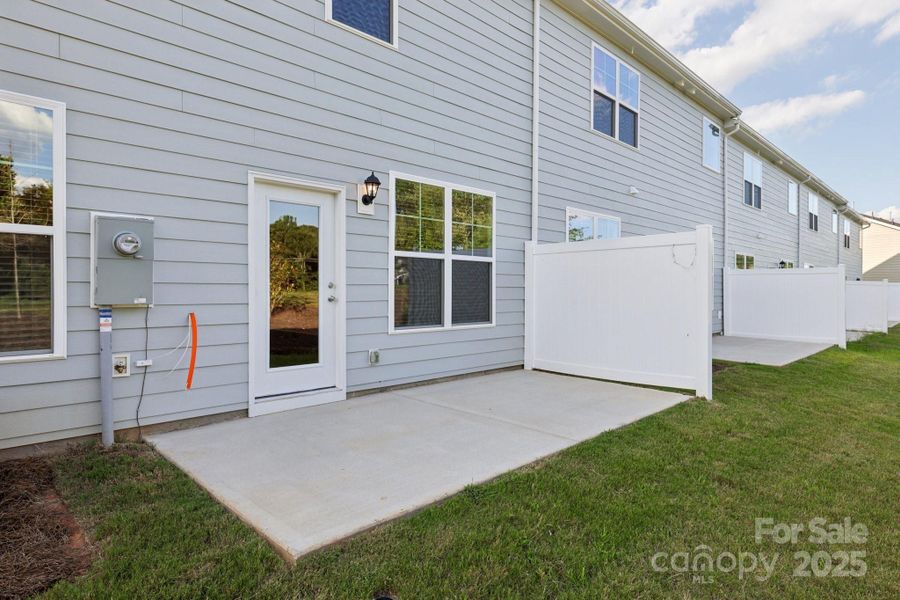 Front exterior of a new home in Blackstone Bay Townhomes, Sherrills Ford, NC, highlighting curb appeal (Image 1).