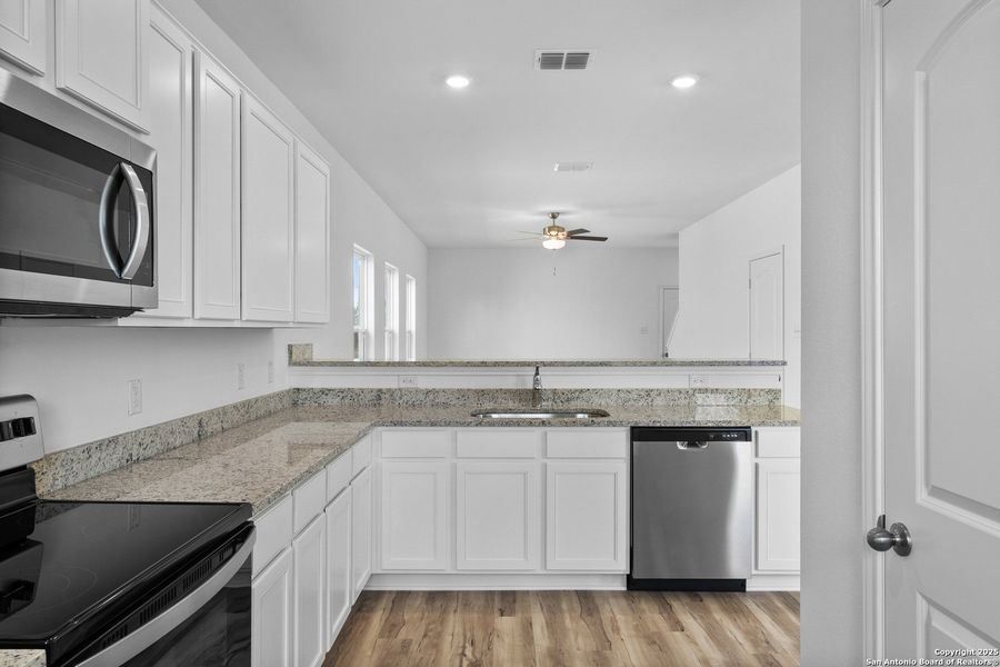 Furnished interior view inside a new home in Blue Wing, San Antonio (Image 5). Furnished interior view inside a new home in Blue Wing, San Antonio (Image 5).