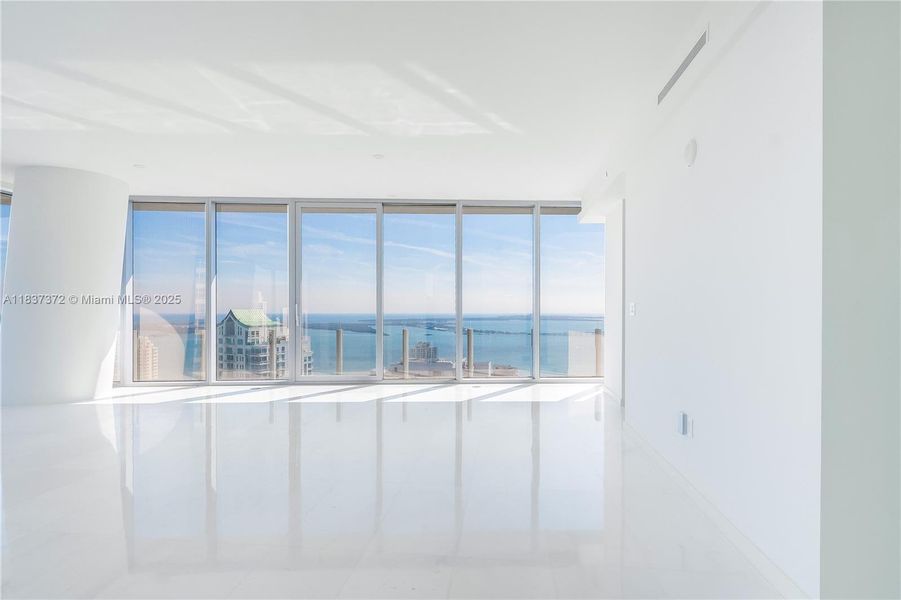 Spacious, unfurnished interior of a new home in Aston Martin Residences, Miami (Image 12). Spacious, unfurnished interior of a new home in Aston Martin Residences, Miami (Image 12).