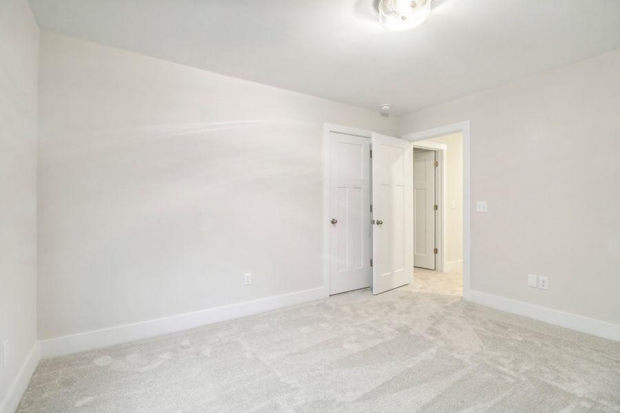 Representative unfurnished interior of a home built from the Baymore II by Great Southern Homes in Edwards Ridge, Central (Image 32).