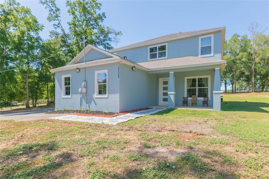 Exterior details and patio area of a home in , Dade City (Image 30).