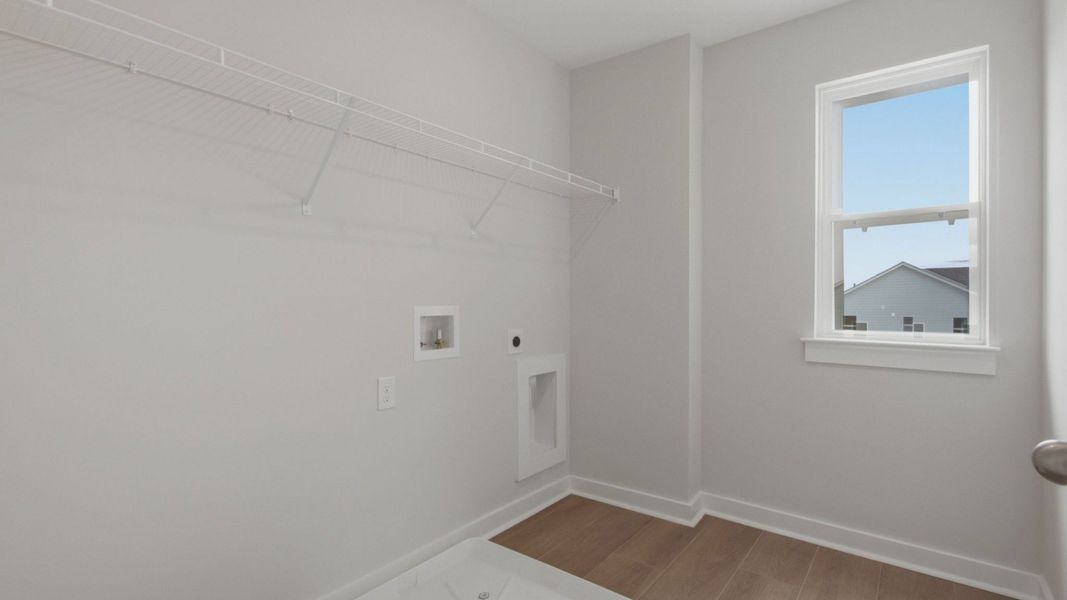 Dedicated laundry room with natural light