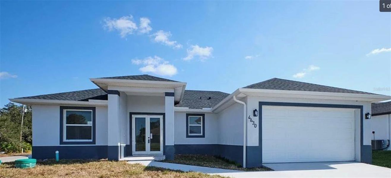 Front exterior of a new home in , Lehigh Acres, FL, highlighting curb appeal (Image 17). Front exterior of a new home in , Lehigh Acres, FL, highlighting curb appeal (Image 17).
