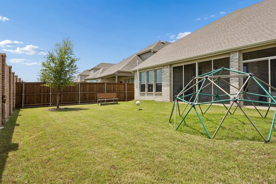 Exterior details and patio area of a home in , Little Elm (Image 20).