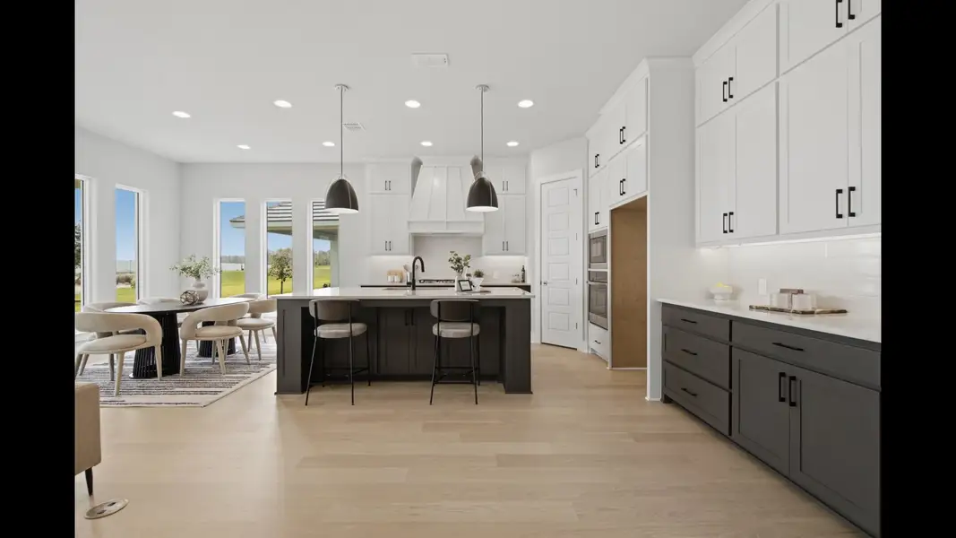 Representative furnished interior of a home built from the 2546F by Perry Homes in Sanctuary at Seaire, Parrish (Image 4).