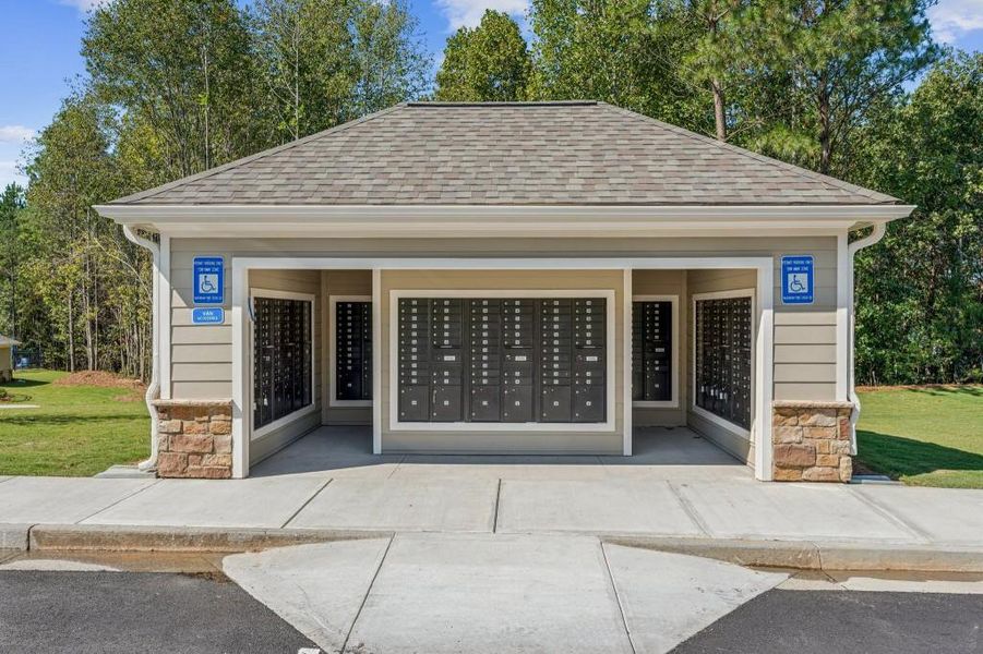 Front exterior of a new home in Parkside at Carter Grove, Cartersville, GA, highlighting curb appeal (Image 2).