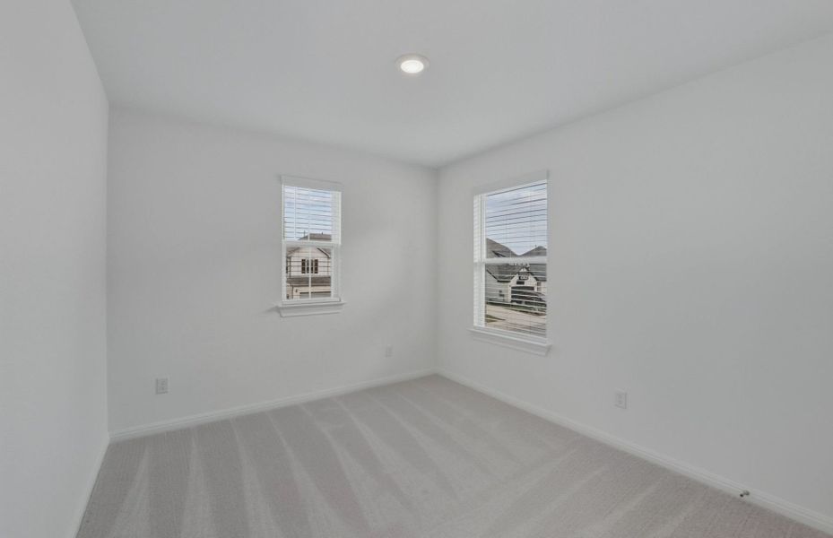 Spacious, unfurnished interior of a new home in Wolf Ranch, Georgetown (Image 32).