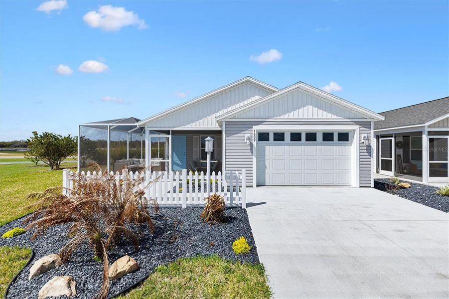 Front exterior of a new home in , The Villages, FL, highlighting curb appeal (Image 24). Front exterior of a new home in , The Villages, FL, highlighting curb appeal (Image 24).