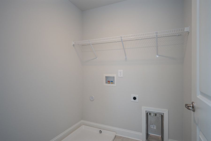 Representative unfurnished interior of a home built from the 3030 by Adams Homes in Parkland Place, Pace (Image 31).