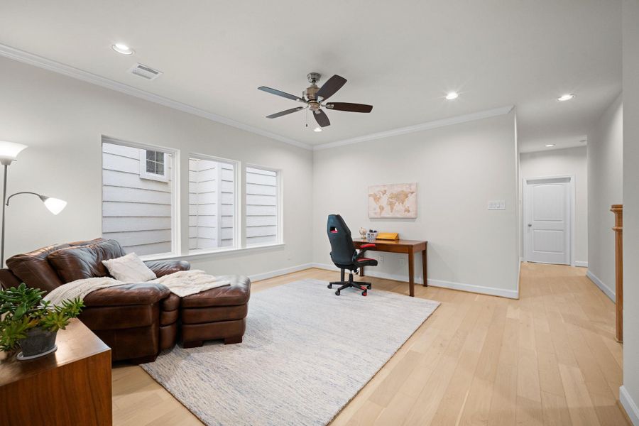 The game room sits between the primary suite and the secondary bedrooms, creating a true split plan on the second floor — privacy built right into the layout. The game room sits between the primary suite and the secondary bedrooms, creating a true split plan on the second floor — privacy built right into the layout.
