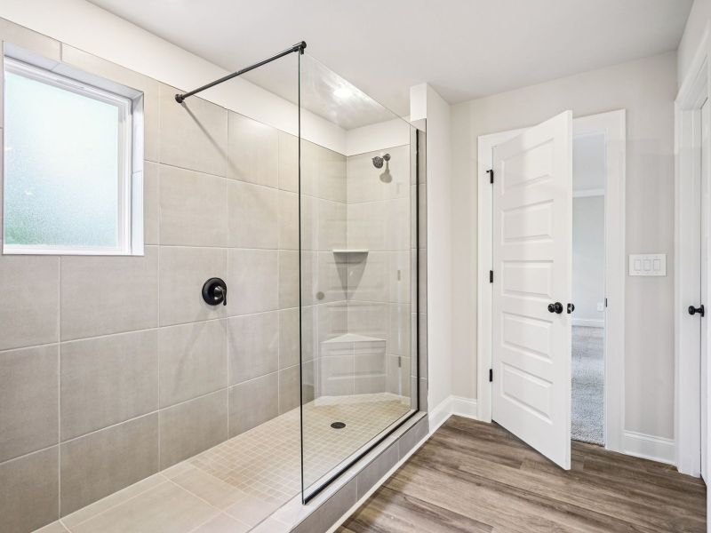 Furnished interior view inside a new home in Martin Springs - Estate Series, Lawrenceville (Image 8).