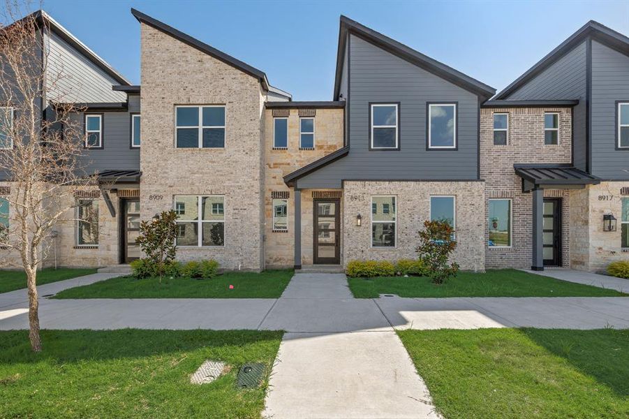 Front exterior of a new home in , Rowlett, TX, highlighting curb appeal (Image 13). Front exterior of a new home in , Rowlett, TX, highlighting curb appeal (Image 13).