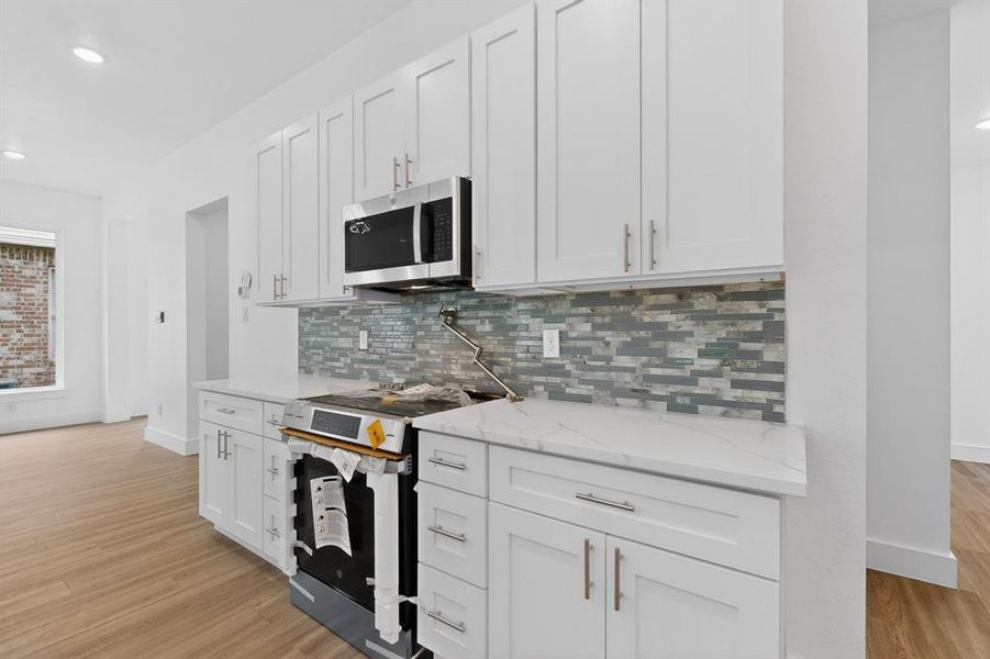 Furnished interior view inside a new home in , Whitney (Image 8). Furnished interior view inside a new home in , Whitney (Image 8).