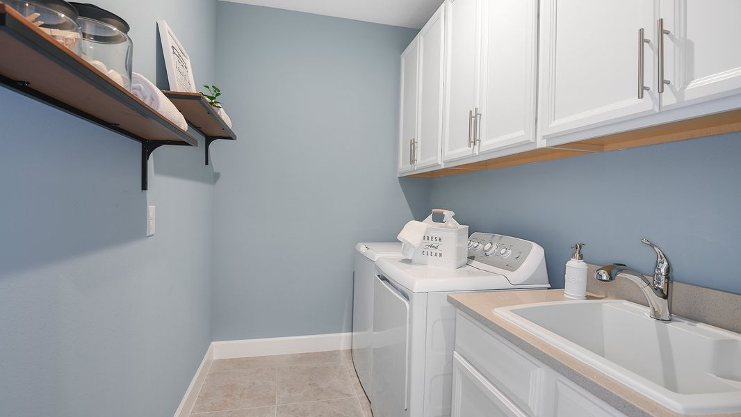 Representative furnished interior of a home built from the Ibis by Taylor Morrison in Esplanade at Skye Ranch, Sarasota (Image 12).