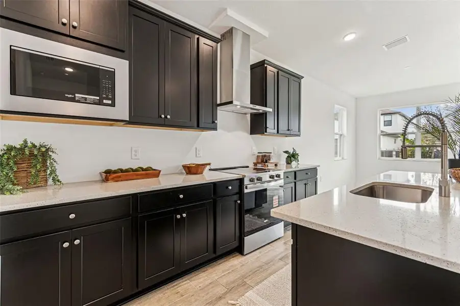 Furnished interior view inside a new home in Isles at Bayview, Parrish (Image 4). Furnished interior view inside a new home in Isles at Bayview, Parrish (Image 4).