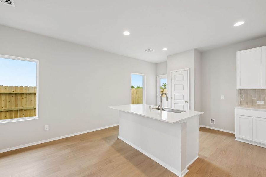 Furnished interior view inside a new home in Azalea, Pattison (Image 7).