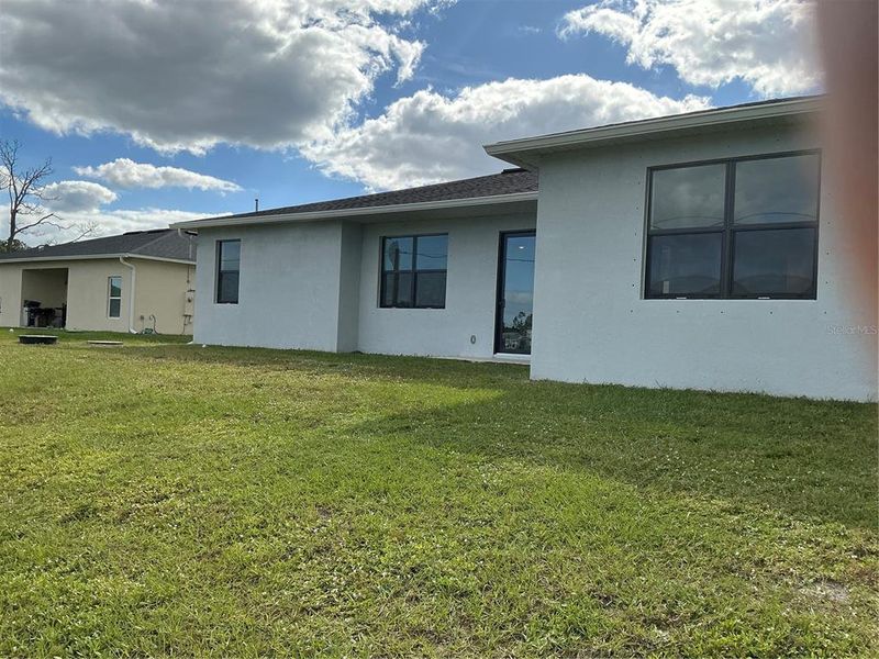 Exterior details and patio area of a home in , Palm Bay (Image 2).