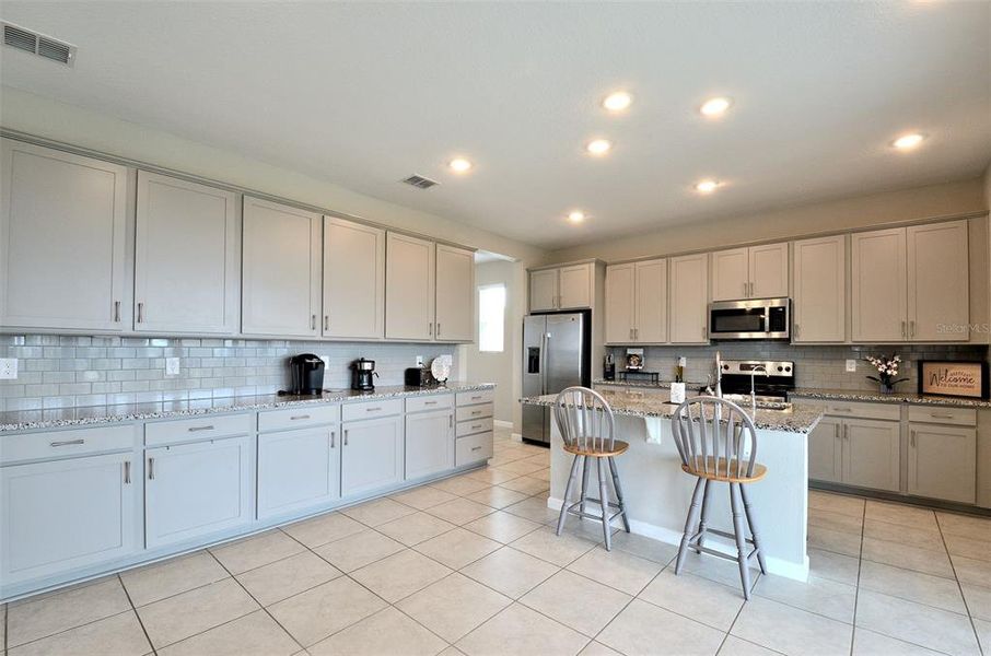 Furnished interior view inside a new home in Seasons at Eden Hills, Lake Alfred (Image 6).