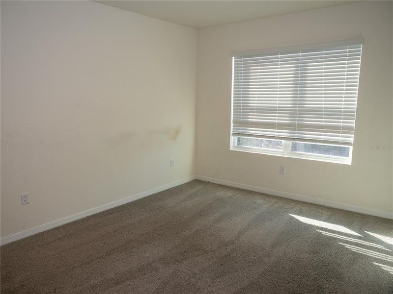 Spacious, unfurnished interior of a new home in Poinciana Enclave, Kissimmee (Image 14).