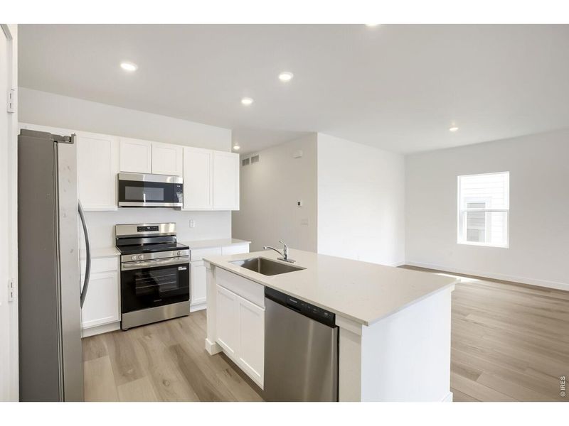 Furnished interior view inside a new home in Prairie Song, Windsor (Image 7).