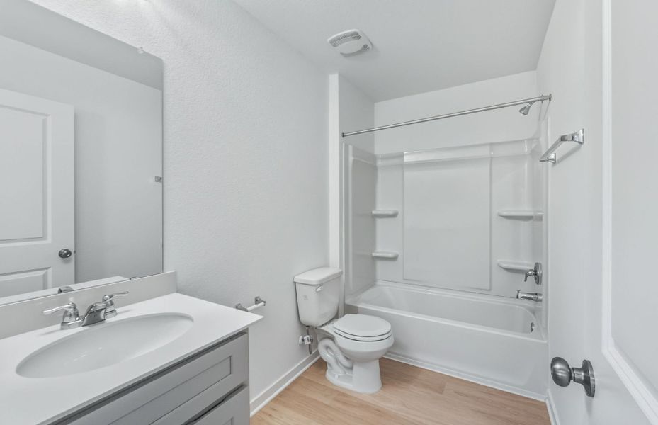 Furnished interior view inside a new home in Sunfield, Buda (Image 5).