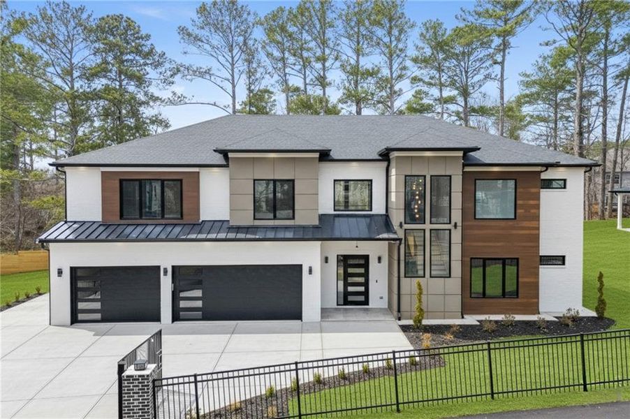 Front exterior of a new home in , Lawrenceville, GA, highlighting curb appeal (Image 26).