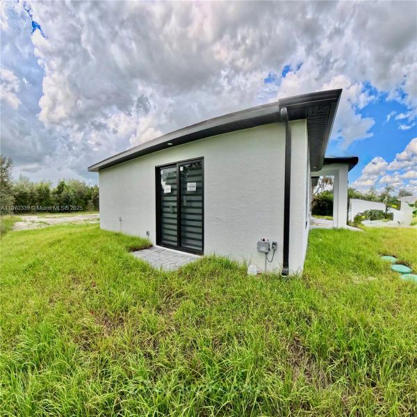 Exterior details and patio area of a home in , Lehigh Acres (Image 21). Exterior details and patio area of a home in , Lehigh Acres (Image 21).