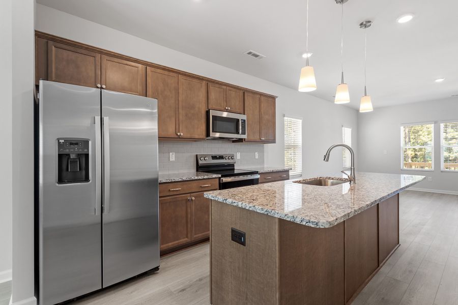 Furnished interior view inside a new home in Renaissance at White Oak, Garner (Image 7). Furnished interior view inside a new home in Renaissance at White Oak, Garner (Image 7).