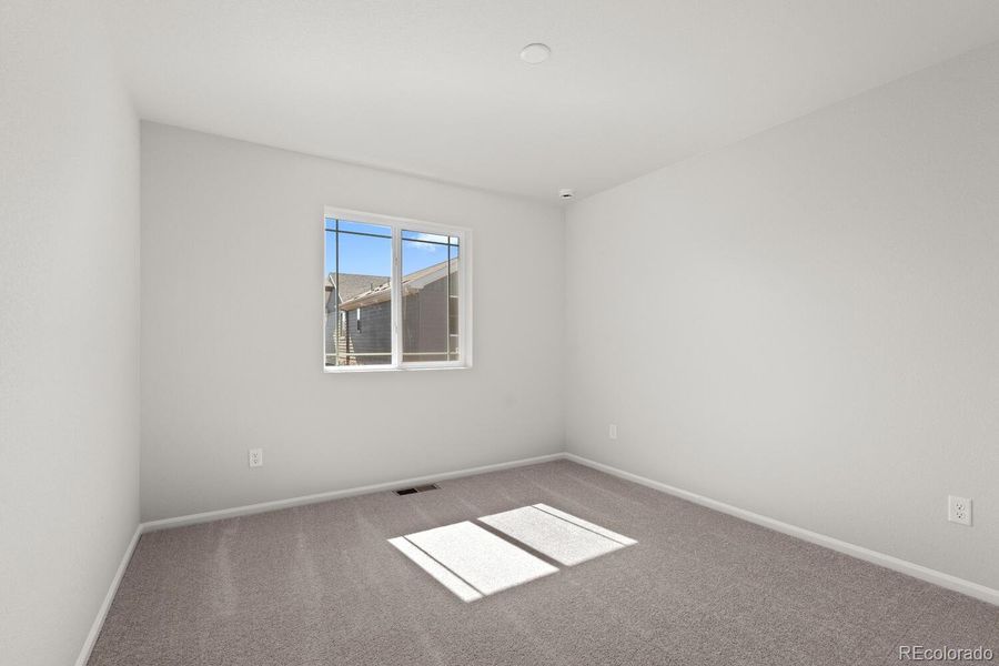 Spacious, unfurnished interior of a new home in The Villas Collection at Sterling Ranch, Littleton (Image 20).