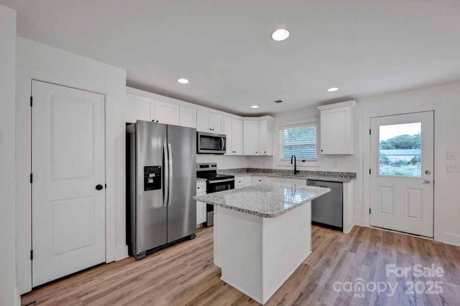 Furnished interior view inside a new home in , Concord (Image 12).