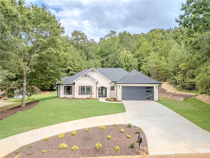 Front exterior of a new home in , Rome, GA, highlighting curb appeal (Image 2). Front exterior of a new home in , Rome, GA, highlighting curb appeal (Image 2).