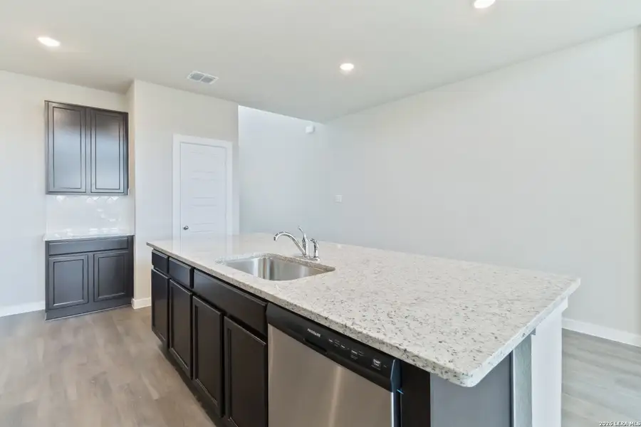 Furnished interior view inside a new home in Hunters Ranch, San Antonio (Image 4).