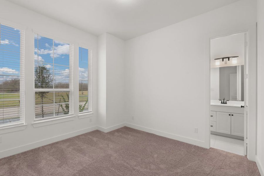 Representative unfurnished interior of a home built from the Palmer by Chesmar Homes in Riceland Alley Loads, Mont Belvieu (Image 32).