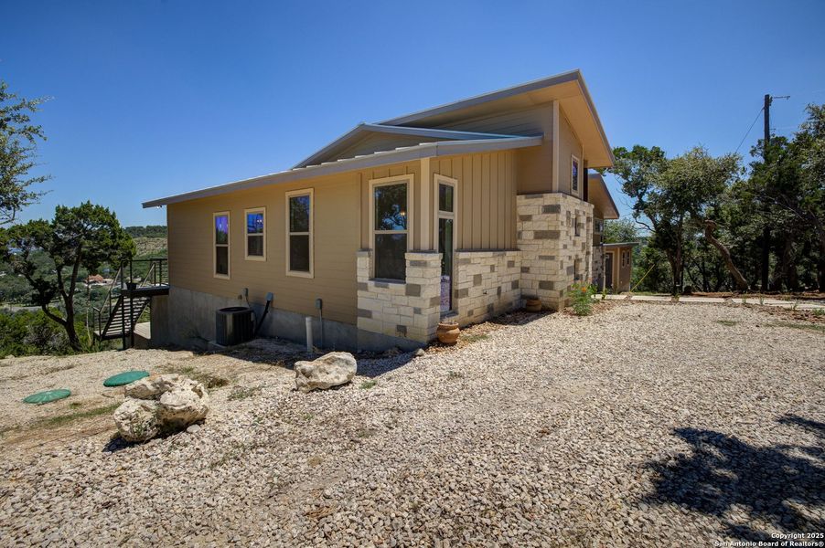 Front exterior of a new home in , New Braunfels, TX, highlighting curb appeal (Image 1). Front exterior of a new home in , New Braunfels, TX, highlighting curb appeal (Image 1).
