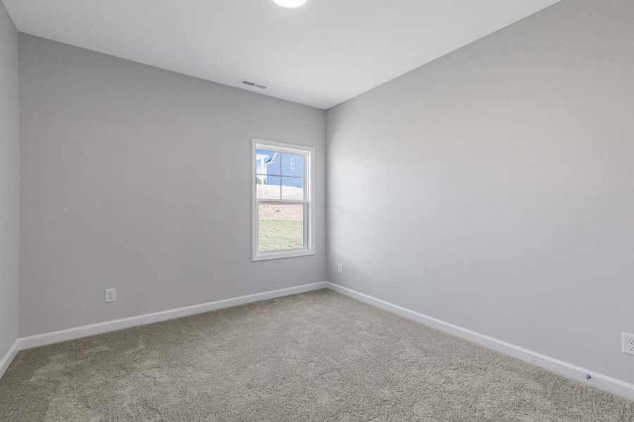 Representative unfurnished interior of a home built from the Weymouth by Caviness & Cates Communities in Bartlett Manor, Youngsville (Image 155).