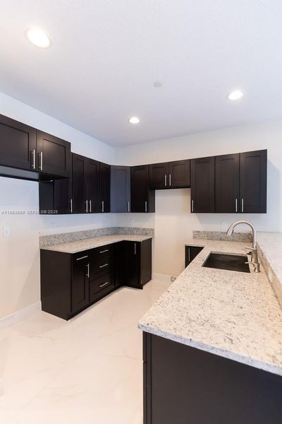 Furnished interior view inside a new home in , Tamarac (Image 41).