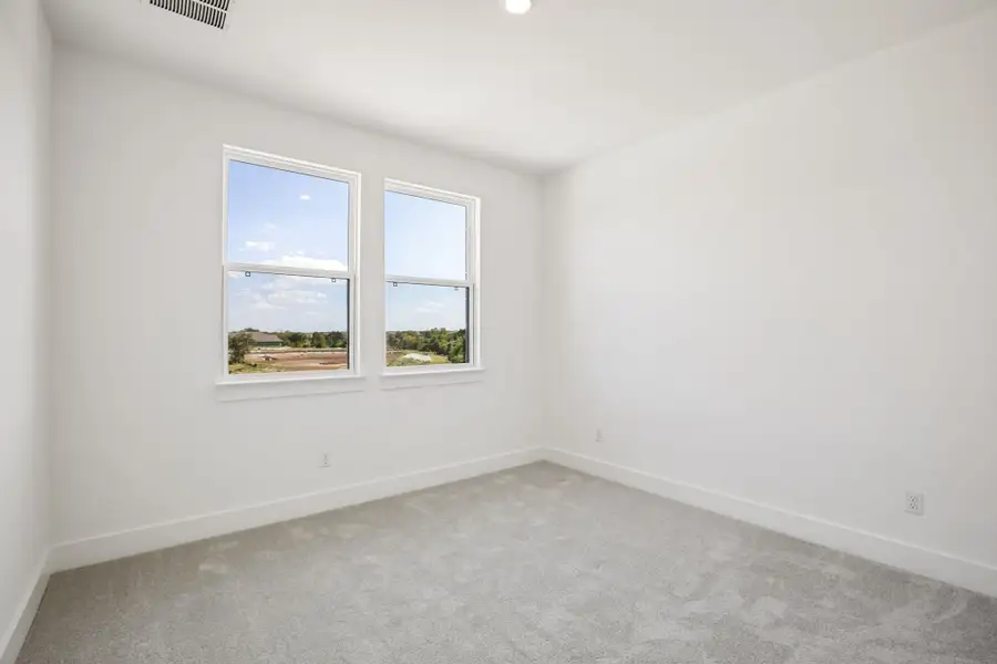 Representative unfurnished interior of a home built from the Anderson by Taylor Morrison in Easton Park, Austin (Image 40).