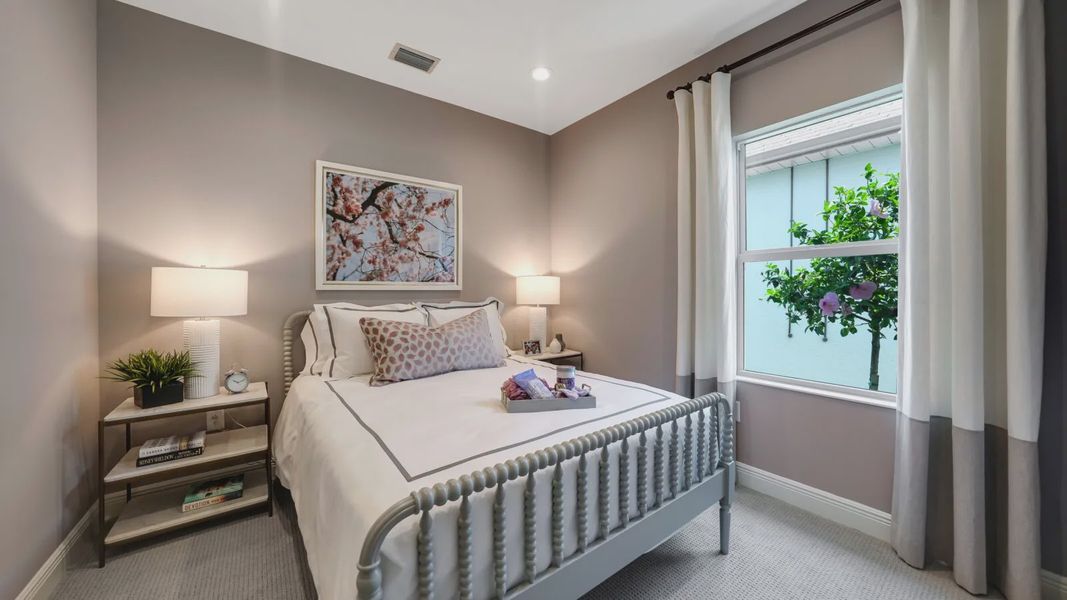 Representative furnished interior of a home built from the Dream 2 by Neal Communities in SkySail, Naples (Image 10).