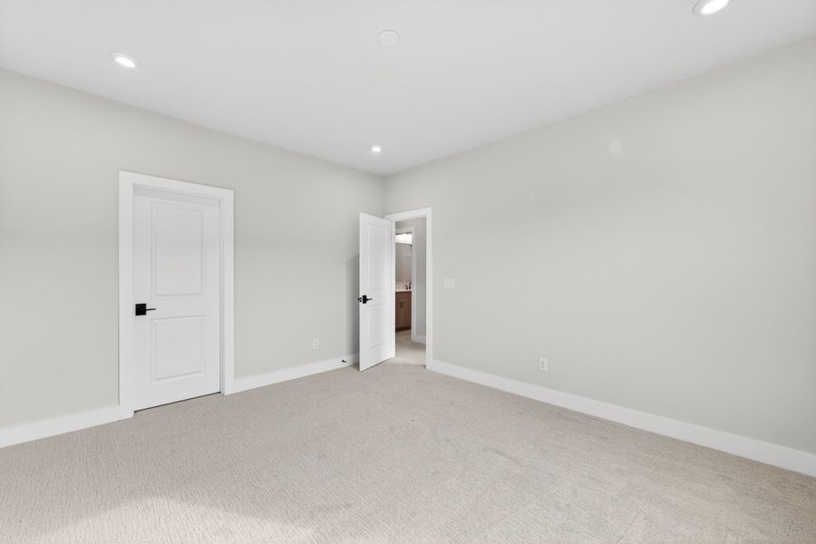 Spacious, unfurnished interior of a new home in Seven Oaks, Belmont (Image 44).