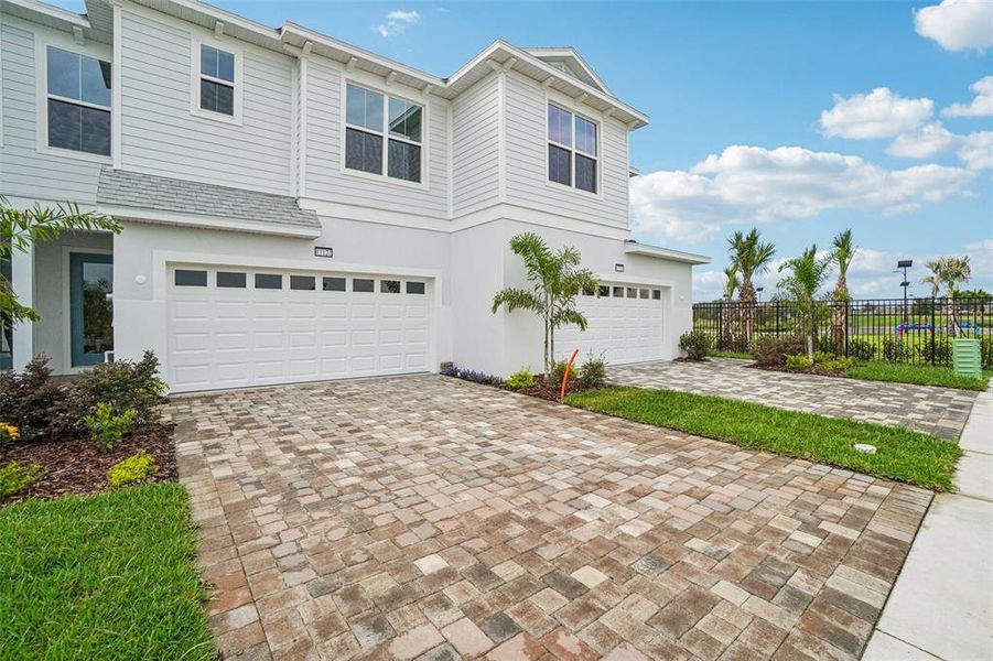 Front exterior of a new home in Isla Mirada, San Antonio, FL, highlighting curb appeal (Image 29).