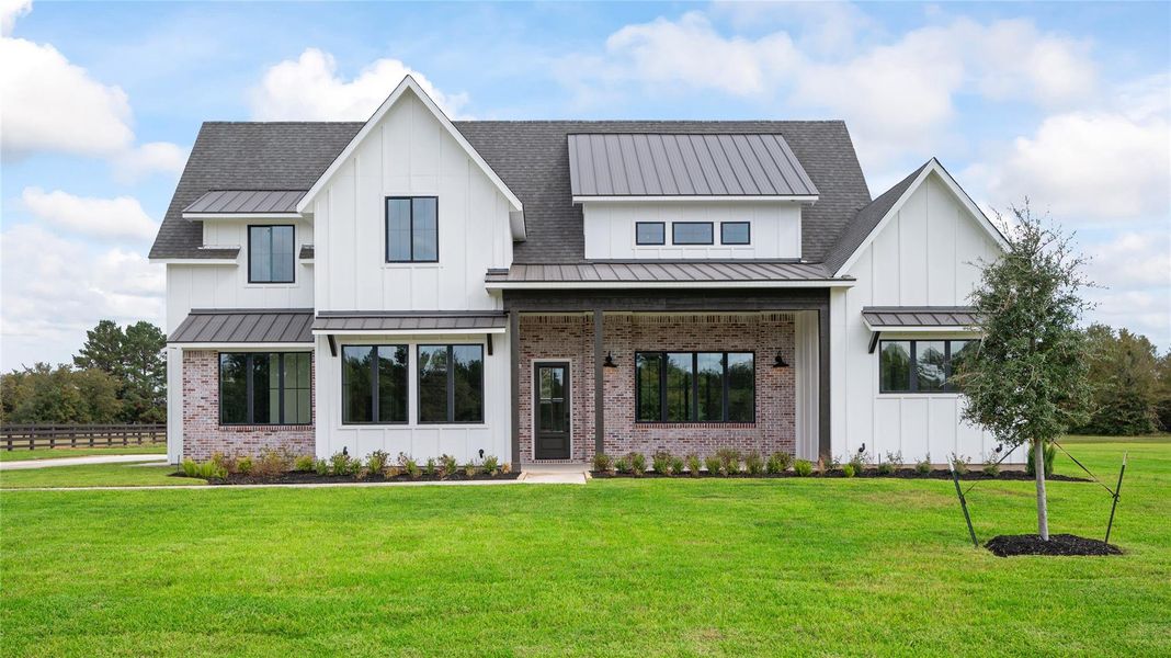 Front exterior of a new home in , Montgomery, TX, highlighting curb appeal (Image 27).