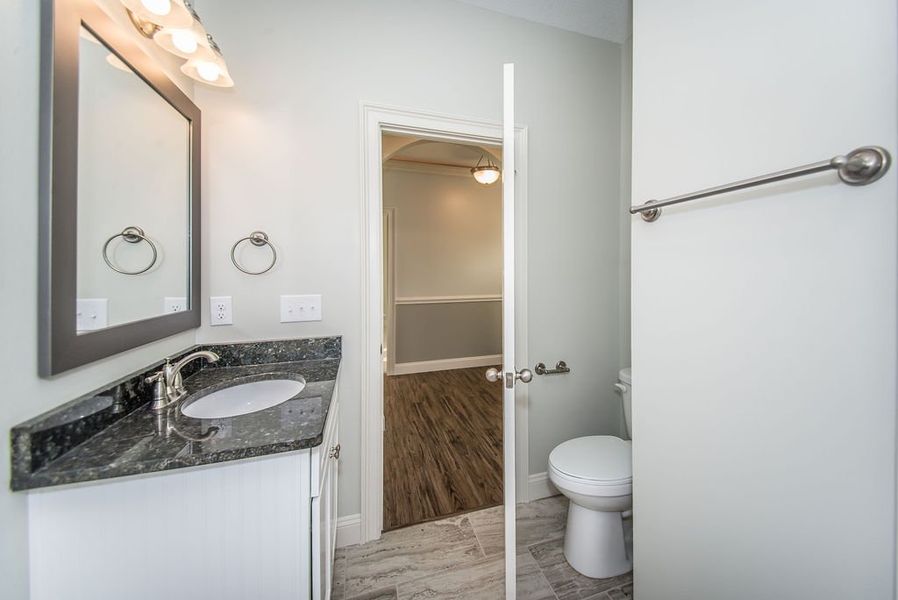 Representative furnished interior of a home built from the Mediterranean by Enchanted Homes in Messer Farms, Inman (Image 6).