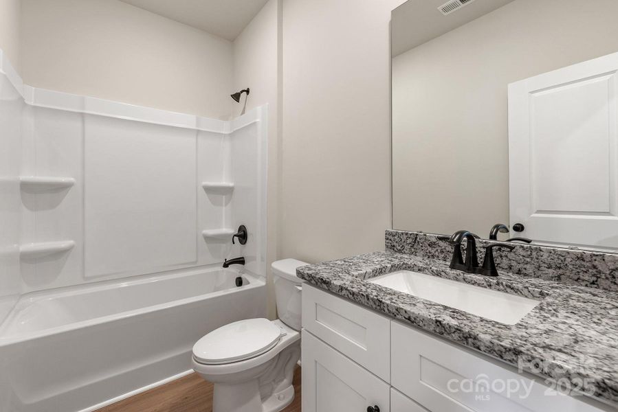 Furnished interior view inside a new home in Ascot Woods, Charlotte (Image 4). Furnished interior view inside a new home in Ascot Woods, Charlotte (Image 4).