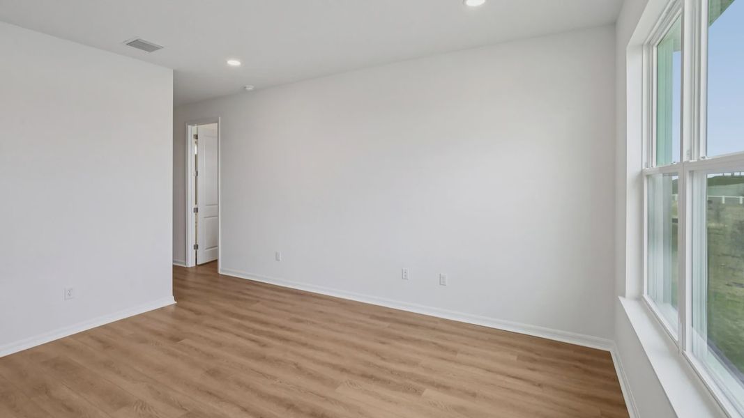 Furnished interior view inside a new home in Isla Mirada, San Antonio (Image 25).