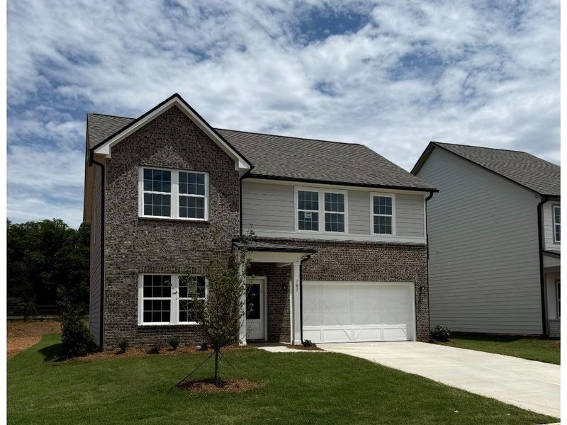 Front exterior of a new home in Langston Reserve, Cartersville, GA, highlighting curb appeal (Image 2). Front exterior of a new home in Langston Reserve, Cartersville, GA, highlighting curb appeal (Image 2).