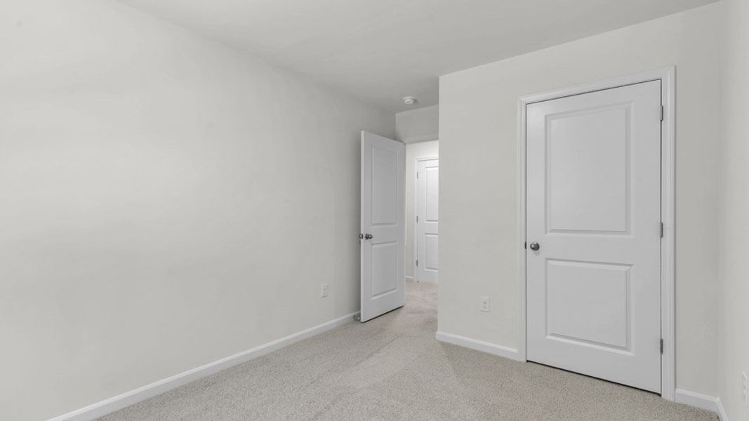 Spacious, unfurnished interior of a new home in The Townes at Bexford, Willow Spring (Image 19). Spacious, unfurnished interior of a new home in The Townes at Bexford, Willow Spring (Image 19).