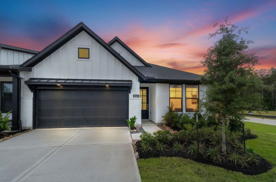 Front exterior of a new home in The Highlands, Porter, TX, highlighting curb appeal (Image 1). Front exterior of a new home in The Highlands, Porter, TX, highlighting curb appeal (Image 1).