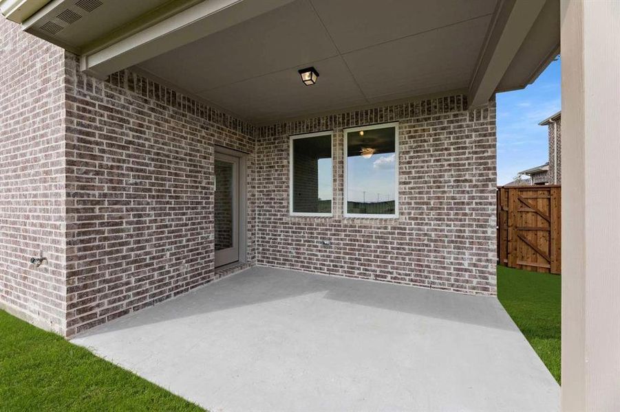 Exterior details and patio area of a home in Creekview Fossil Ridge, Pilot Point (Image 4). Exterior details and patio area of a home in Creekview Fossil Ridge, Pilot Point (Image 4).