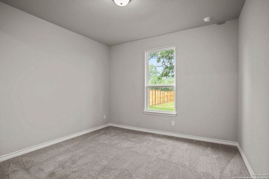 Spacious, unfurnished interior of a new home in Potranco Oaks, Castroville (Image 37).